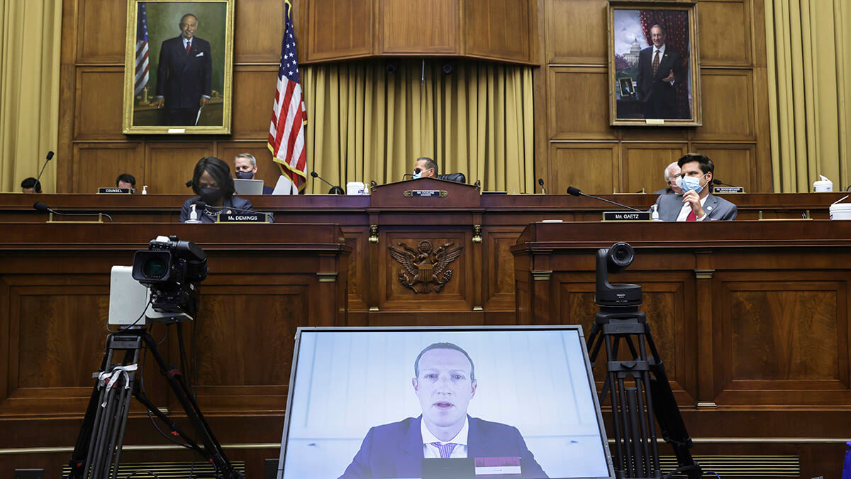 The Latest Zuckerberg questioned on viral misinformation
